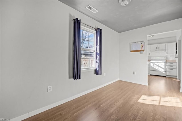 504 Glendale Ave, Norfolk, VA 23505 - spare room with visible vents, light wood-style flooring, and baseboards