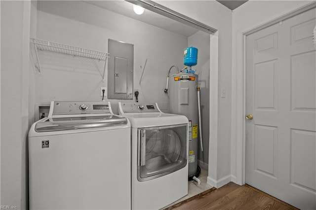 504 Glendale Ave, Norfolk, VA 23505 - washroom featuring laundry area, electric panel, water heater, wood finished floors, and washer and clothes dryer