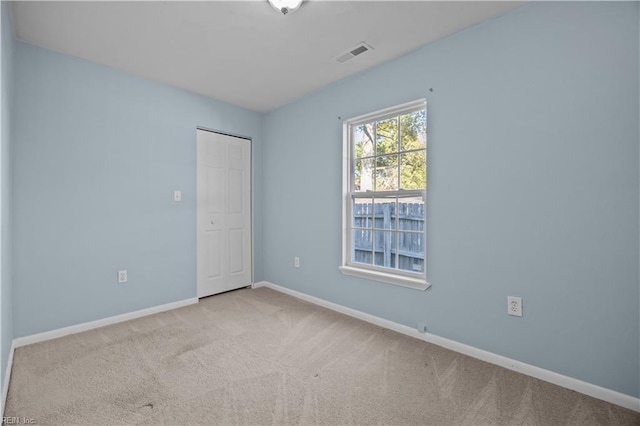 504 Glendale Ave, Norfolk, VA 23505 - spare room featuring carpet flooring, visible vents, and baseboards