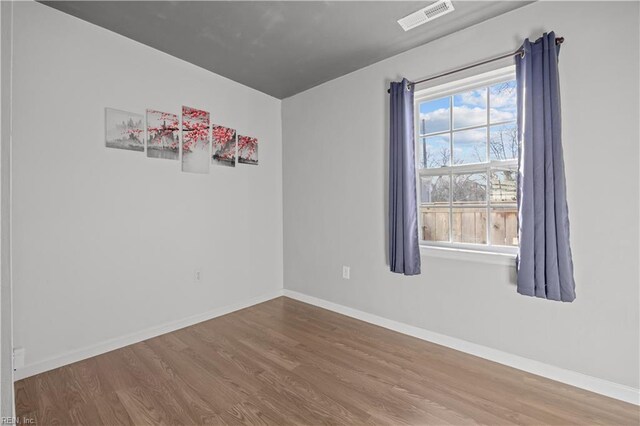 504 Glendale Ave, Norfolk, VA 23505 - unfurnished room with visible vents, baseboards, and wood finished floors