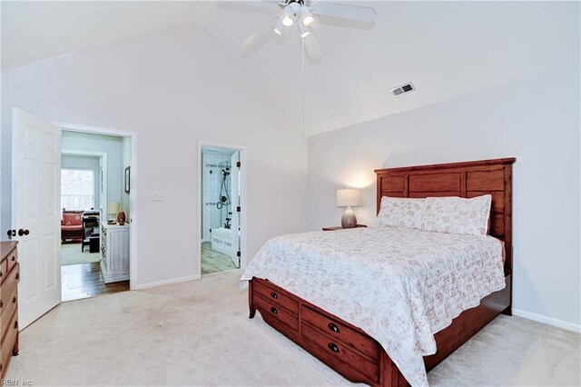 bedroom with visible vents, baseboards, and light carpet