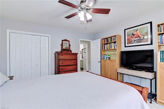 bedroom featuring a closet and a ceiling fan