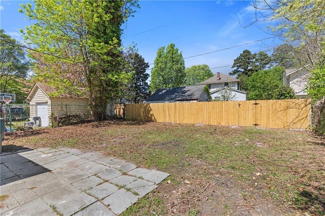 view of yard with a patio and fence
