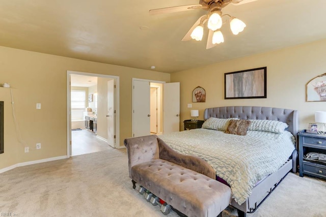 bedroom with light carpet, baseboards, and a ceiling fan