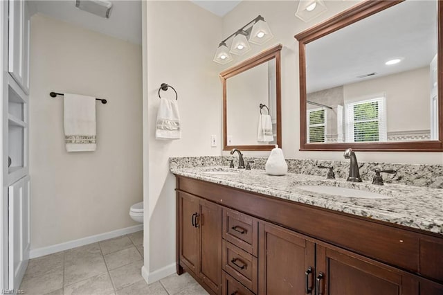 bathroom with a sink, visible vents, toilet, and a shower with shower door