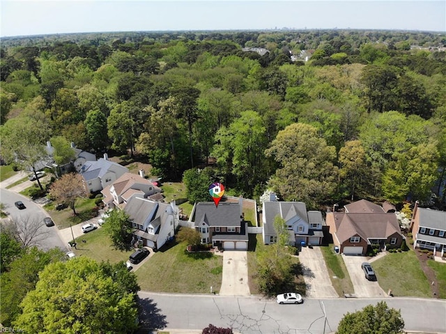 aerial view with a forest view and a residential view