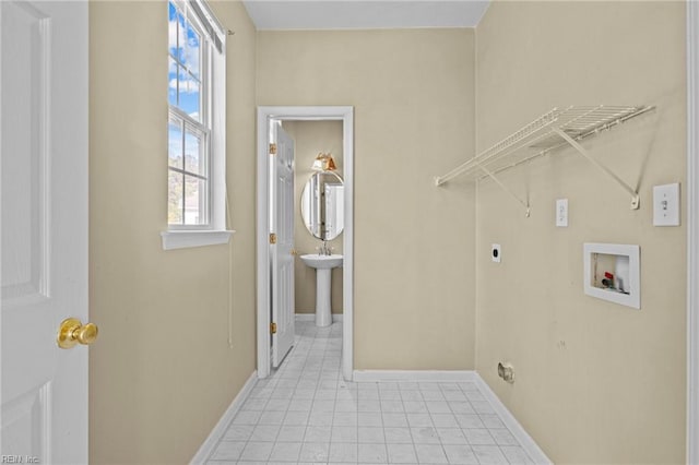 laundry area featuring laundry area, washer hookup, baseboards, and hookup for an electric dryer