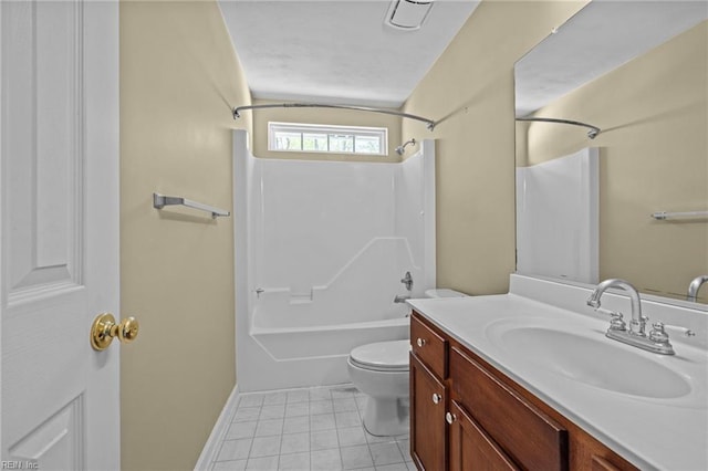 bathroom with vanity, baseboards, tile patterned floors, shower / bath combination, and toilet