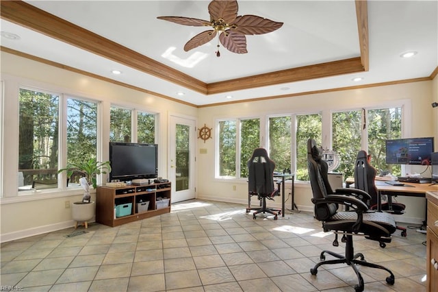 office with a raised ceiling, crown molding, ceiling fan, and baseboards
