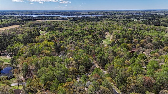 aerial view featuring a view of trees