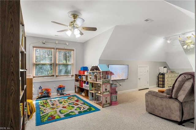 recreation room with carpet floors, ceiling fan, baseboards, and lofted ceiling