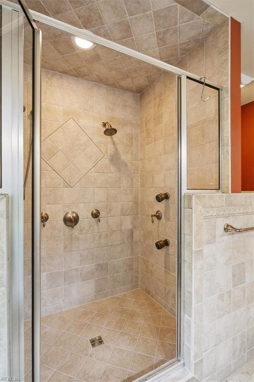 bathroom featuring a stall shower