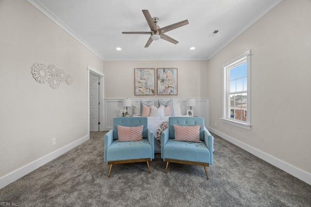 living area featuring baseboards, carpet floors, crown molding, and ceiling fan