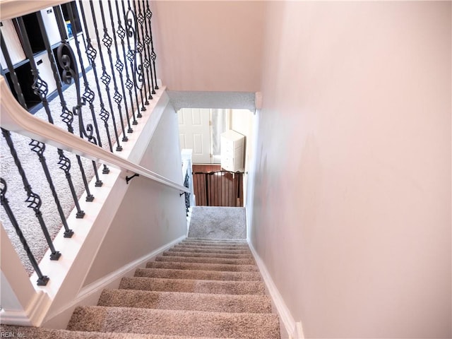 4734 Kempsville Greens Pkwy, Virginia Beach, VA 23462 - staircase with a high ceiling, baseboards, carpet, and plenty of natural light