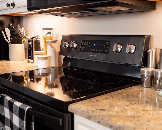 4734 Kempsville Greens Pkwy, Virginia Beach, VA 23462 - room details featuring white cabinets, black electric range oven, and light stone countertops