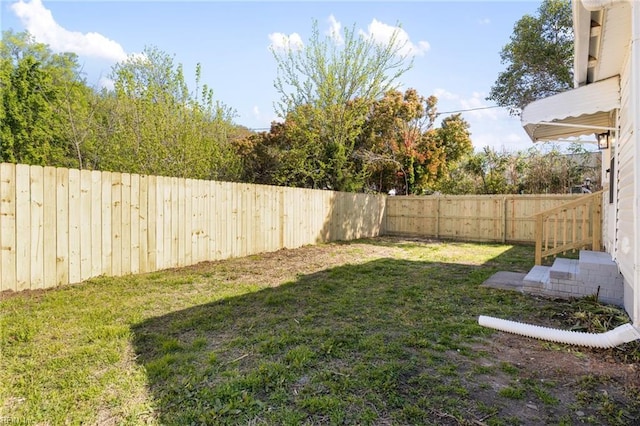 view of yard featuring a fenced backyard