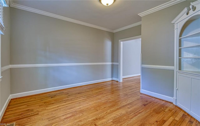217 Hurley Ave, Newport News, VA 23601 - spare room featuring light wood-style floors, crown molding, and baseboards