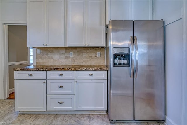 217 Hurley Ave, Newport News, VA 23601 - kitchen featuring dark stone counters, stainless steel fridge with ice dispenser, baseboards, and white cabinetry
