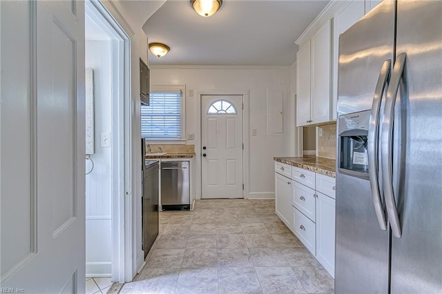 217 Hurley Ave, Newport News, VA 23601 - kitchen featuring crown molding, stone counters, white cabinetry, appliances with stainless steel finishes, and baseboards