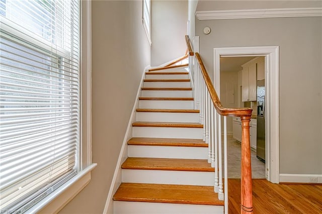 217 Hurley Ave, Newport News, VA 23601 - stairway with baseboards, crown molding, and wood finished floors