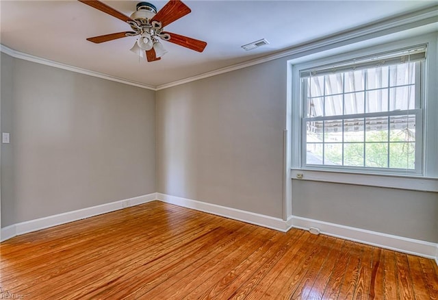217 Hurley Ave, Newport News, VA 23601 - spare room with crown molding, visible vents, baseboards, and hardwood / wood-style flooring