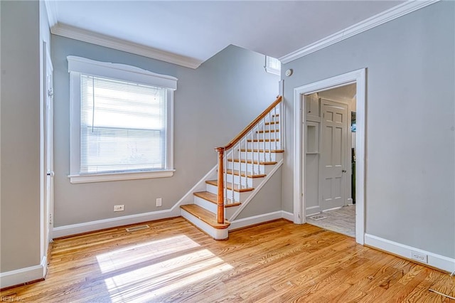 217 Hurley Ave, Newport News, VA 23601 - stairway with wood finished floors, ornamental molding, and visible vents