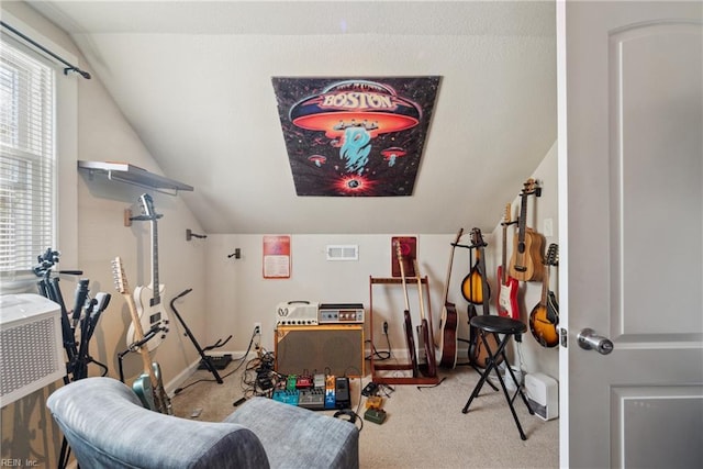 rec room featuring baseboards, vaulted ceiling, and carpet floors