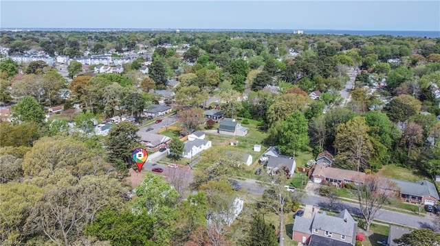 birds eye view of property with a residential view