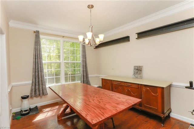 dining room with a chandelier, crown molding, baseboards, and dark wood-style flooring