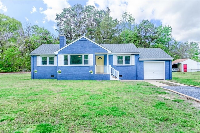 ranch-style home featuring an attached garage, a chimney, driveway, and a front yard