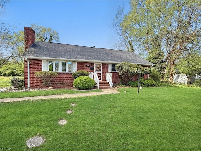 1279 Old Buckroe Rd, Hampton, VA 23663 - ranch-style house featuring a chimney, a front lawn, and brick siding
