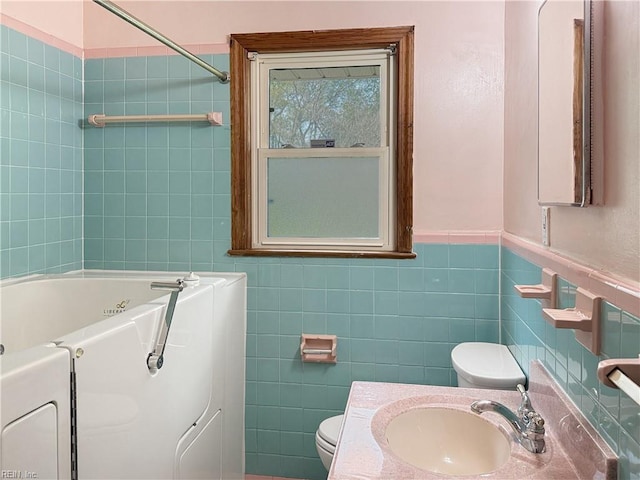 1279 Old Buckroe Rd, Hampton, VA 23663 - bathroom with tile walls, a sink, and toilet