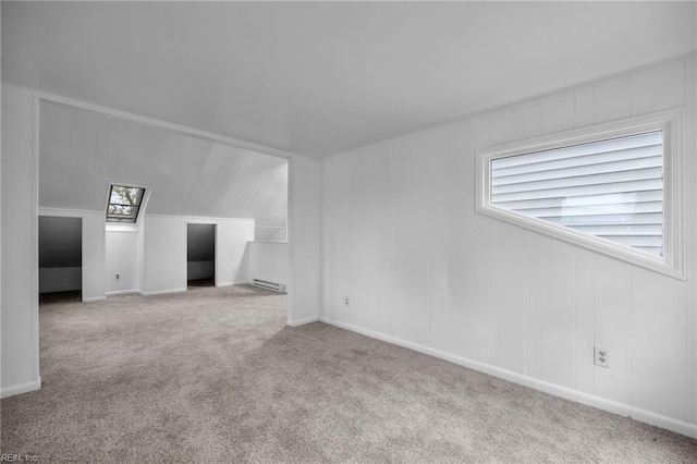 carpeted spare room with baseboards
