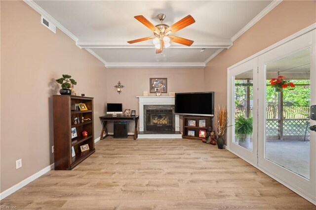 943 Tabb Lakes Dr, Yorktown, VA 23693 - living area with light wood-style flooring, beamed ceiling, a ceiling fan, and visible vents
