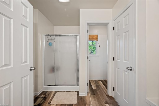 943 Tabb Lakes Dr, Yorktown, VA 23693 - full bath with a shower stall, wood finished floors, and baseboards