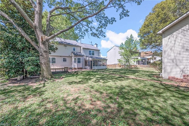 943 Tabb Lakes Dr, Yorktown, VA 23693 - view of yard with fence and a sunroom