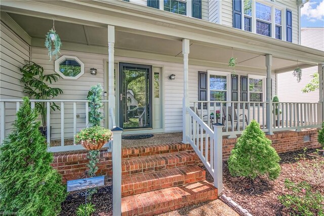 943 Tabb Lakes Dr, Yorktown, VA 23693 - view of exterior entry with a porch