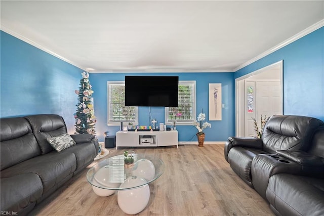 943 Tabb Lakes Dr, Yorktown, VA 23693 - living room featuring crown molding, baseboards, and wood finished floors