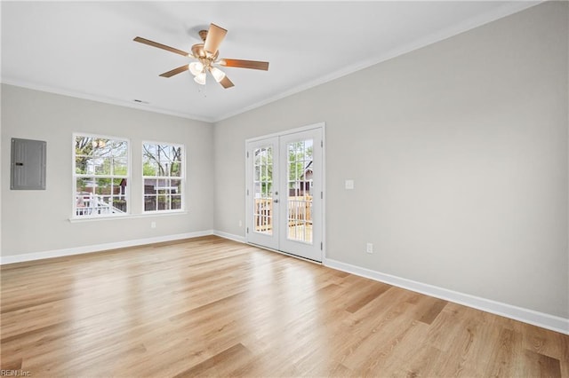 unfurnished room featuring light wood-style floors, a ceiling fan, electric panel, french doors, and baseboards