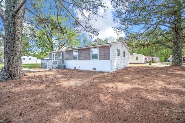 view of front of property with crawl space