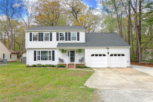 view of front of house with a front yard, an attached garage, covered porch, cooling unit, and concrete driveway