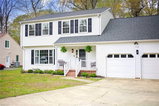 view of front of house featuring a porch, a front lawn, an attached garage, a shingled roof, and concrete driveway