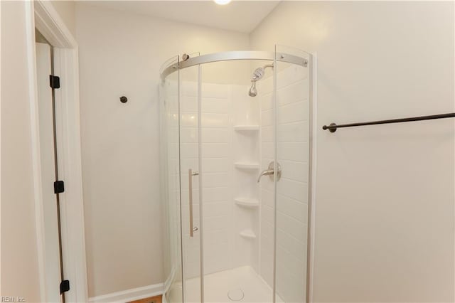 bathroom featuring a stall shower