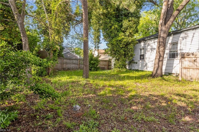 view of yard featuring fence