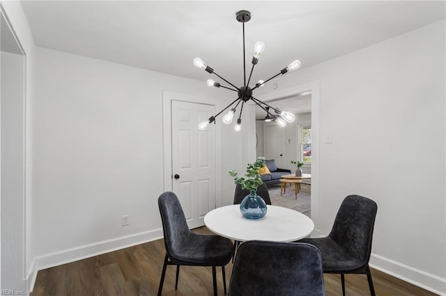 139 Ash Ave, Newport News, VA 23607 - dining area with a chandelier, baseboards, and dark wood finished floors