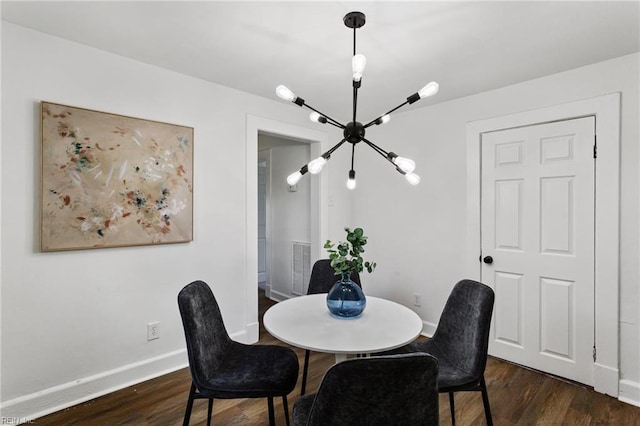 139 Ash Ave, Newport News, VA 23607 - dining area featuring visible vents, dark wood-style flooring, a notable chandelier, and baseboards