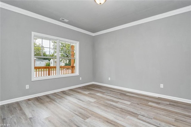 731 33rd St, Newport News, VA 23607 - spare room featuring crown molding, wood finished floors, baseboards, and visible vents