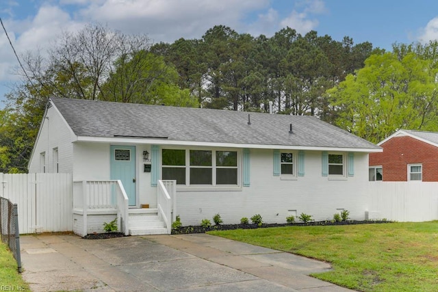 1793 Old Buckroe Rd, Hampton, VA 23664 - single story home with roof with shingles, a front yard, and fence
