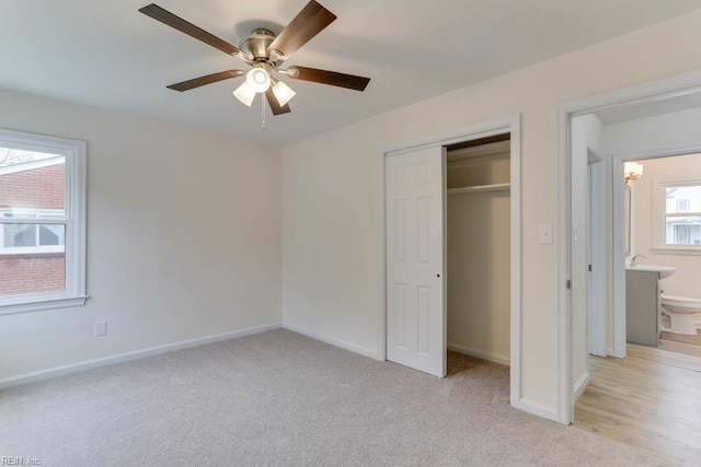 1793 Old Buckroe Rd, Hampton, VA 23664 - unfurnished bedroom featuring a closet, baseboards, and light carpet