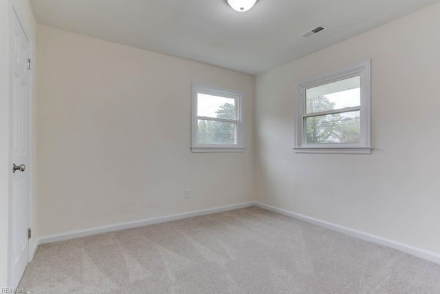 1793 Old Buckroe Rd, Hampton, VA 23664 - spare room featuring light carpet, visible vents, and baseboards